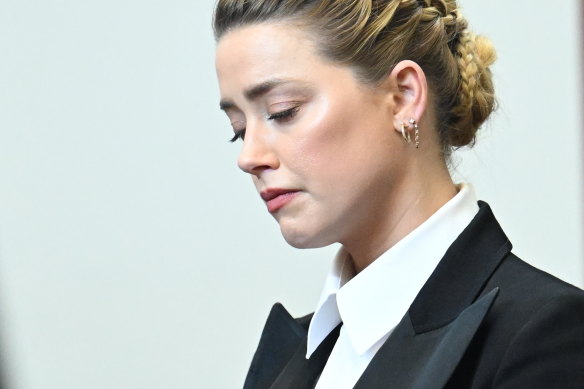 Actor Amber Heard listens in the courtroom as a psychiatrist says the actress had been sexually assualted.