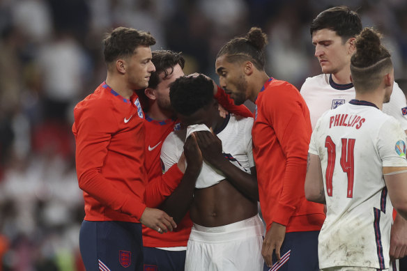 A heartbroken Bukayo Saka after his penalty miss.