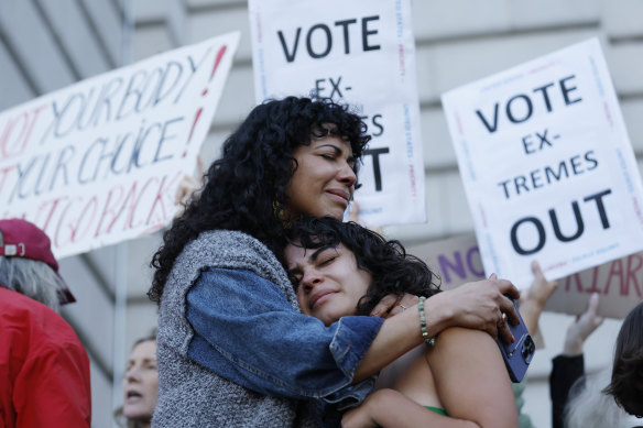 Mitzi Rivas, left, hugs her daughter Maya Iribarren during an abortion-rights protest at City Hall in San Francisco following the Supreme Court’s decision to overturn Roe v. Wade.