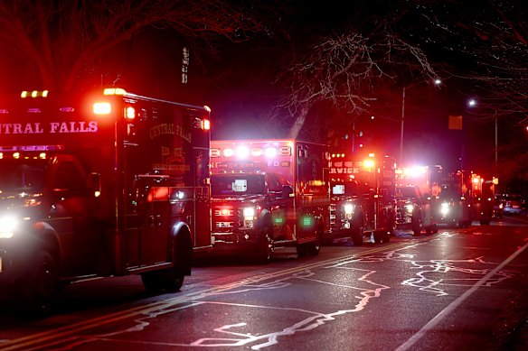 Ambulances line Hope Street at Brown University in Providence.