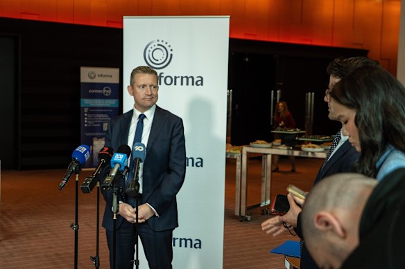 Shadow education minister Brad Rowswell speaking to journalists after his address.