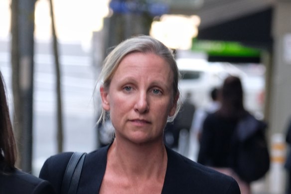 Megan Schutz leaves the IBAC hearing on Monday.