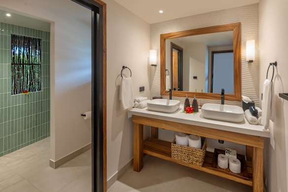 Revamped guest bathrooms are light and airy.