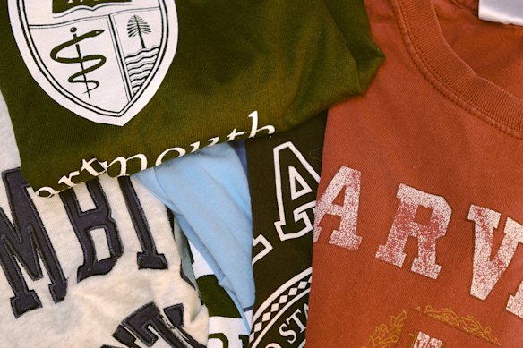 Beaton has amassed quite a collection of college T-shirts.