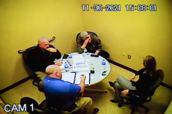 Police footage of James Crombley (top center) and his wife Jennifer (right) being questioned by police.
