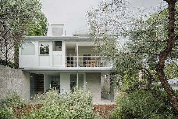 The studio at the rear of the Red Hill workers’ cottage has separate street access that opens onto the garden.