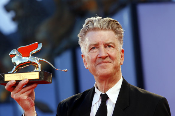US director David Lynch with his Golden Lion lifetime achievement award at the 2006 Venice Film Festival.