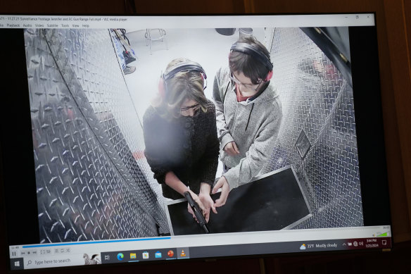 Video showing Jennifer Crumbley, left, with her son Ethan Crumbley at a gun range on November 27, 2021, for target practice.