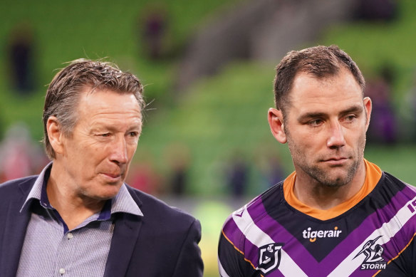 Cameron Smith, right, is close to surpassing the try tally of coach Craig Bellamy, left. 