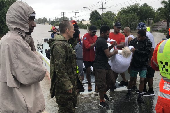 The Fijians helped bring extra manpower to the flood rescues.