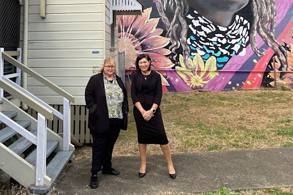 Former minister Leeanne Enoch and Karyn Walsh at the old West End Police Station announcing now-abandoned plans for a health and housing community centre.