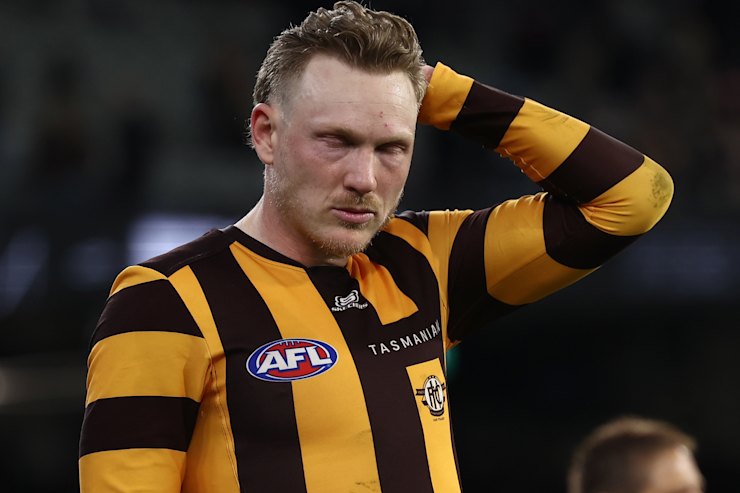 James Sicily on the field in ⁢his Hawthorn guernsey