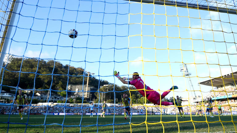 Rocket: O'Neil's long-range shot sails beyond Ben Kennedy into the net.