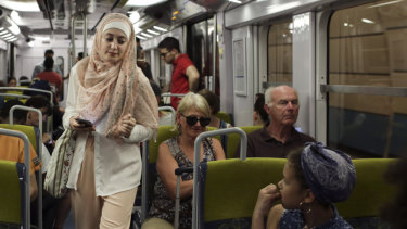 Maryam Pougetoux, a student union leader, commutes to class in Paris. When Pougetoux wore a head scarf during a television interview, the French interior minister called her appearance “shocking.”