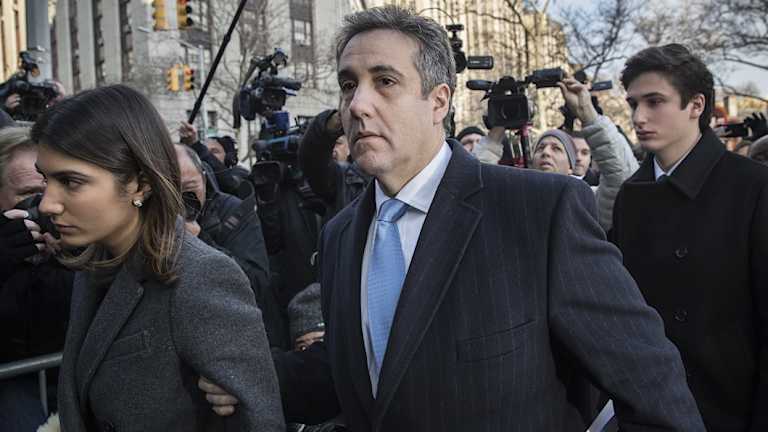Michael Cohen arrives at court this week flanked by his daughter (left) and son (right).