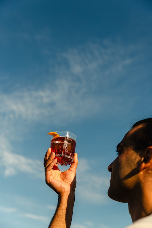 A negroni and blue skies at Husk Farm Distillery.