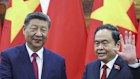 Chinese President Xi Jinping, left, shakes hands with Vietnam's National Assembly Chairman Tran Thanh Man, in Hanoi, Vietnam, Monday April 14, 2025. (Athit Perawongmetha/Pool Photo via AP)
