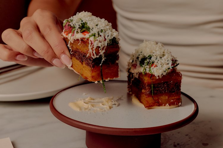 HSP bites: crisp potato with slow-cooked lamb, chilli and garlic sauces.