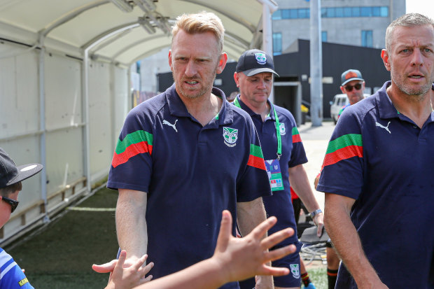 Warriors coach Andrew Webster greets fans during the pre-season.