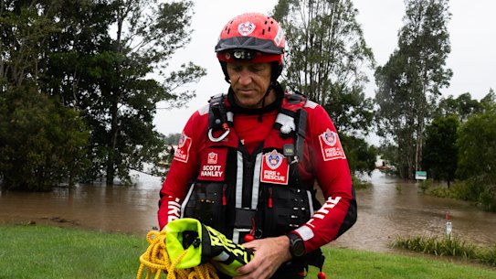 Scott Hanley, team leader of strike force Kilo, NSW Fire and Rescue running drills in Coraki