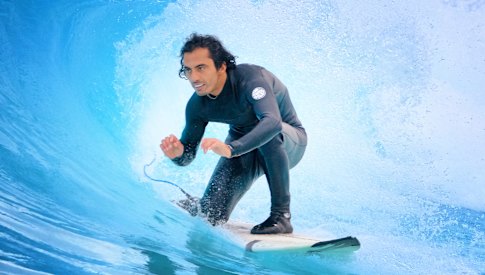 Afghan refugee Masi Mobin, who works on weekends as a guide at URBNSURF surf park in Tullamarine.