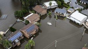 Heavy flooding in Mawson Place, Pitt Town. Water reached the first level in every house on the street in 2022.