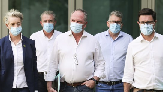 Senior nationals head towards their party room meeting on Sunday. 