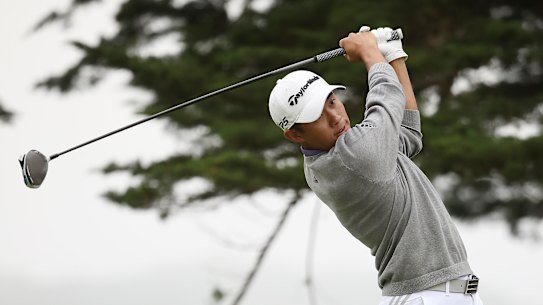 Collin Morikawa watches his stunning tee shot on the 16th hole.