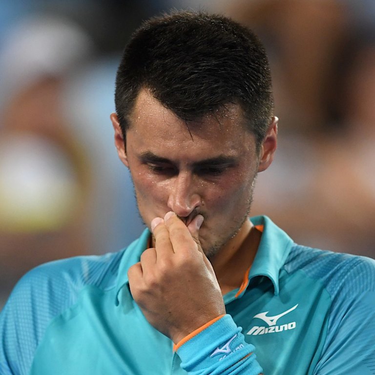 Bernard Tomic of Australia in action against Marin Cilic of Croatia during day one of the Australian Open tennis tournament in Melbourne, Monday, January 14, 2019. (AAP Image/Lukas Coch) NO ARCHIVING, EDITORIAL USE ONLY