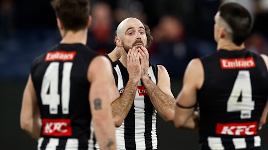 Brody Mihocek, Steele Sidebottom and Brayden Maynard after the Pies’ loss.