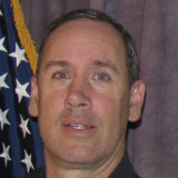 Killed: Officer Eric Talley was first on the scene.