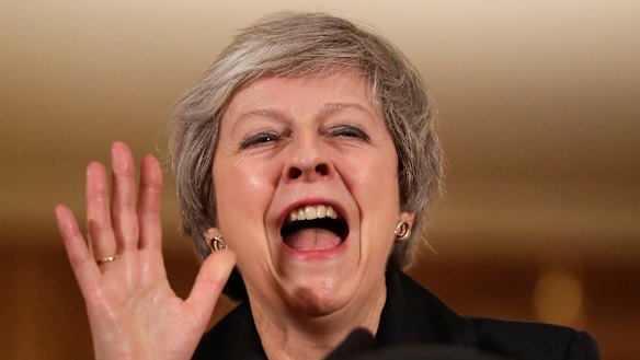 Britain's Prime Minister Theresa May gestures during a press conference inside 10 Downing Street.