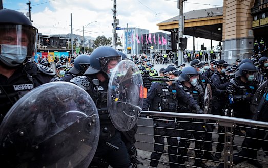 Police face protesters in September