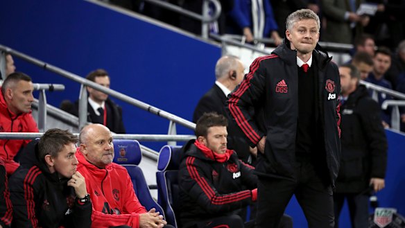 Better days: Central Coast Mariners sporting director Mike Phelan (second from left) on the Manchester United bench.