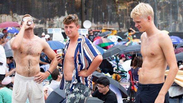 Earlier in the day these friends get into the festive spirit at Circular Quay.