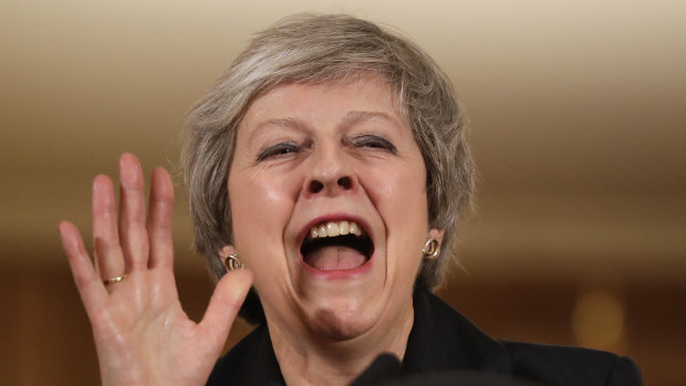 Britain's Prime Minister Theresa May gestures during a press conference inside 10 Downing Street.