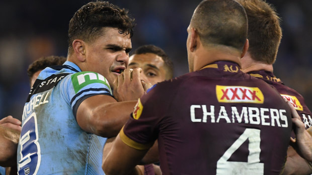 Centre stage: Latrell Mitchell and Will Chambers had a running battle in Origin last year.
