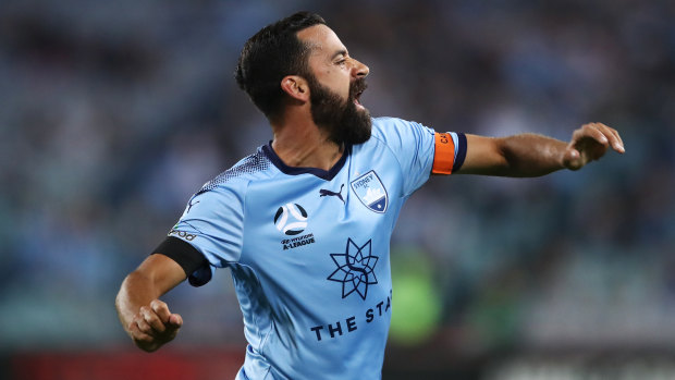 Another one: Alex Brosque roars in celebration after scoring his sixth Sydney derby goal on Saturday night.