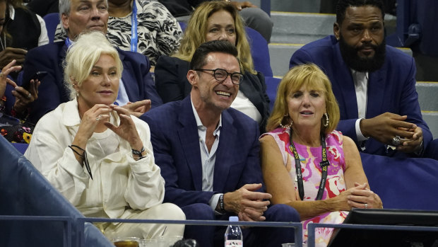 Hugh Jackman watches Serena Williams and Danka Kovinic. 