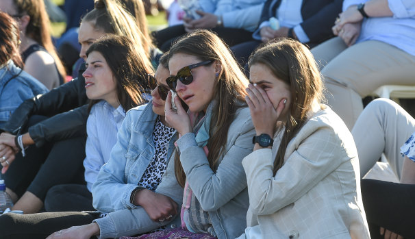 Fans at Moorabbin Oval during the emotional service for Frawley.