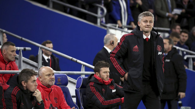 Better days: Central Coast Mariners sporting director Mike Phelan (second from left) on the Manchester United bench.