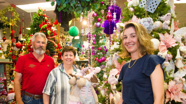 Christmas Barn owners Neville and Leanne de Smet with daughter Carly, who is also part of the business.