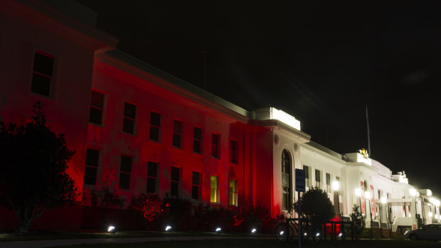 Old Parliament House lit up for cystic fibrosis awareness.