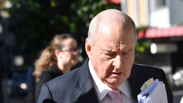 Radio host Alan Jones is seen arriving at the Supreme Court in Brisbane.