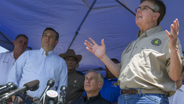 Senator Ted Cruz, second from left, Texas Governor Greg Abbott, second from right, and Lieutenant Governor Dan Patrick, right, speak at a press conference in the wake of the Santa Fe shooting.