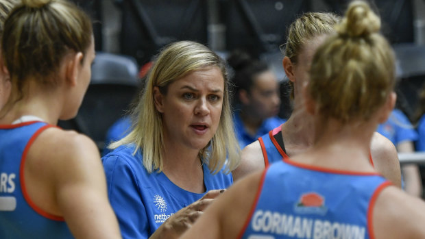 Warning: NSW Swifts coach Briony Akle (centre) says netball "can't be complacent".