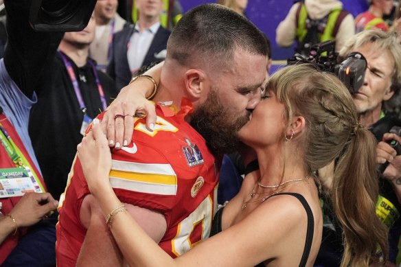 Kansas City Chiefs tight end Travis Kelce kisses Taylor Swift after the NFL Super Bowl 58 football game against the San Francisco 49ers.