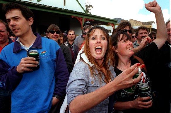 A large crowd gathers to hear the raffle drawn.