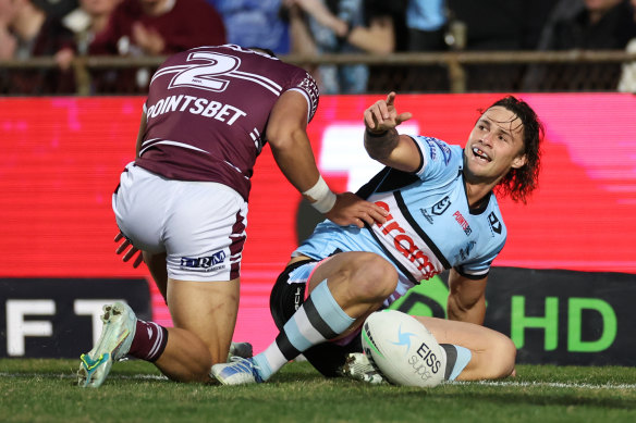 Nicholas Hynes celebrates a try.