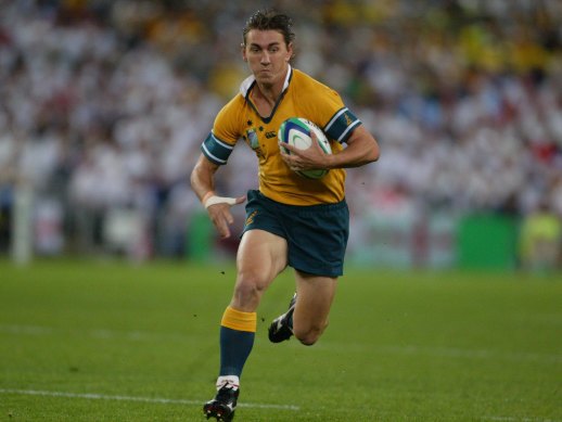 Mat Rogers in full for flight for the Wallabies in 2003. 